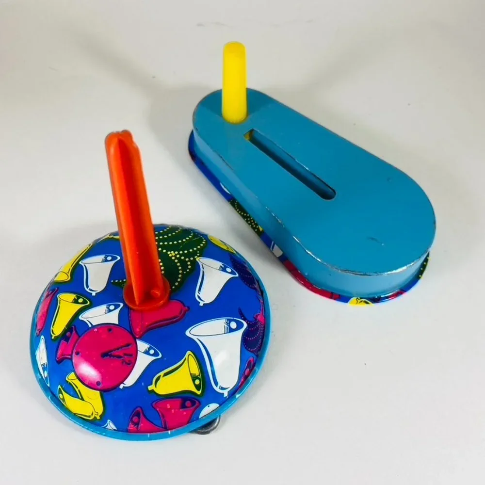 Two vintage tin New Years Eve royal blue cocktail New Years print noise makers.